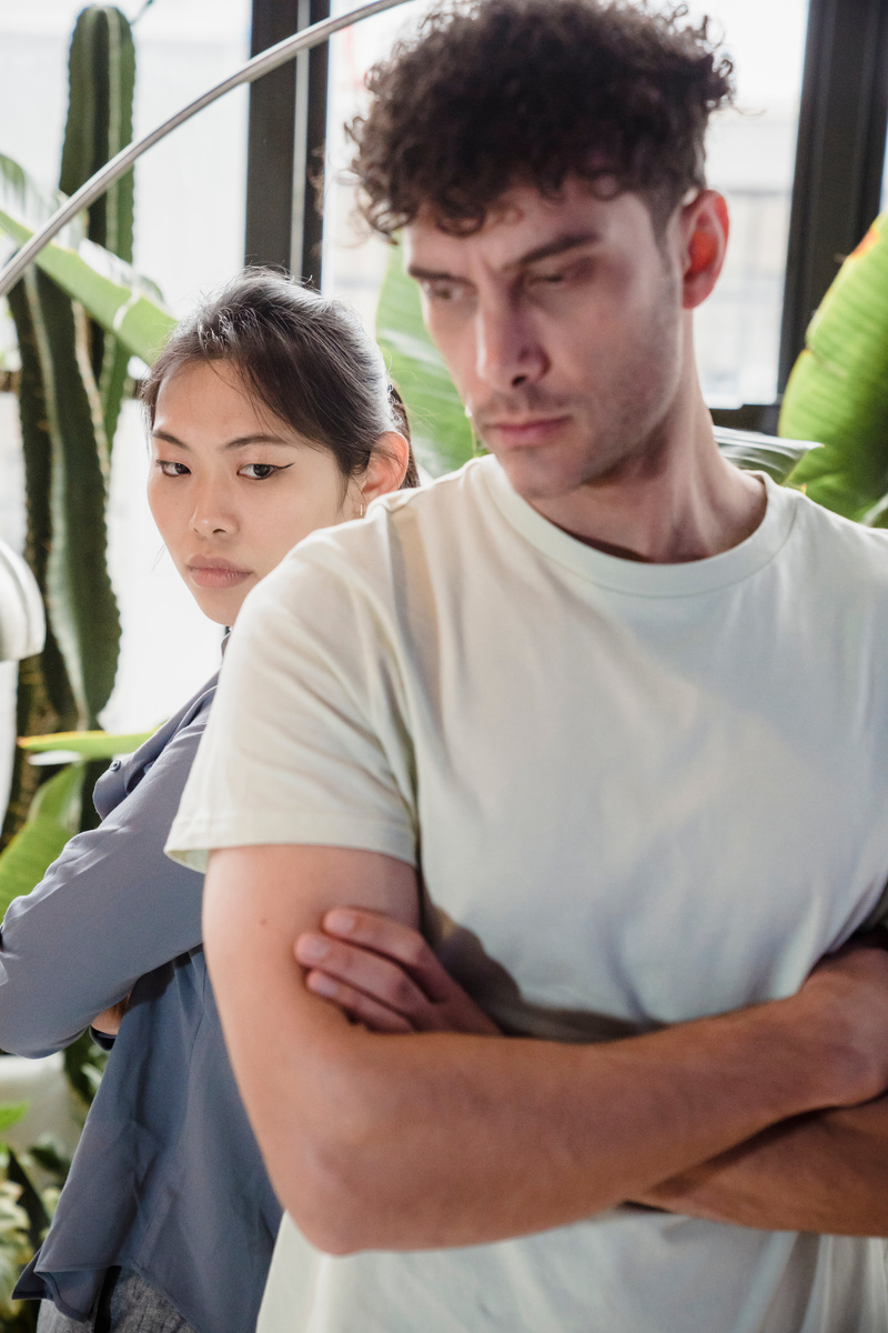 A Couple with Arms Crossed